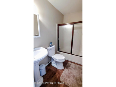 Escape to this cute-as-a-button 3-bedroom, 1-bath chalet with a on The Hideout Golf in Pennsylvania - for sale on GolfHomes.com, golf home, golf lot