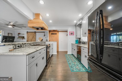 Lakefront Living in Turtle Cove! Welcome to this stunning on Turtle Cove Golf Course in Georgia - for sale on GolfHomes.com, golf home, golf lot