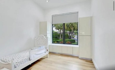 This fully renovated contemporary estate is nestled in the on Broken Sound Golf and Club  in Florida - for sale on GolfHomes.com, golf home, golf lot