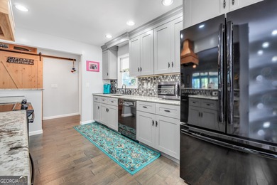 Lakefront Living in Turtle Cove! Welcome to this stunning on Turtle Cove Golf Course in Georgia - for sale on GolfHomes.com, golf home, golf lot