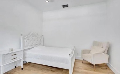 This fully renovated contemporary estate is nestled in the on Broken Sound Golf and Club  in Florida - for sale on GolfHomes.com, golf home, golf lot