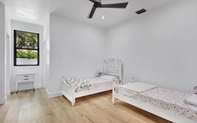 This fully renovated contemporary estate is nestled in the on Broken Sound Golf and Club  in Florida - for sale on GolfHomes.com, golf home, golf lot