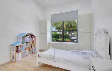 This fully renovated contemporary estate is nestled in the on Broken Sound Golf and Club  in Florida - for sale on GolfHomes.com, golf home, golf lot