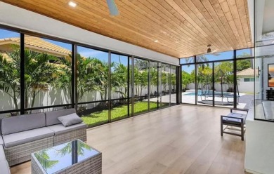 This fully renovated contemporary estate is nestled in the on Broken Sound Golf and Club  in Florida - for sale on GolfHomes.com, golf home, golf lot