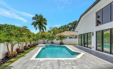 This fully renovated contemporary estate is nestled in the on Broken Sound Golf and Club  in Florida - for sale on GolfHomes.com, golf home, golf lot