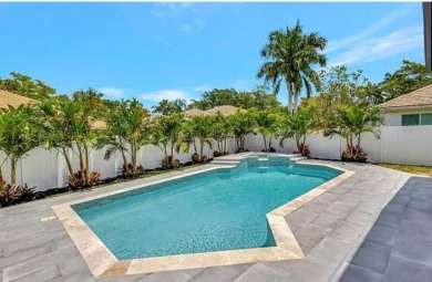 This fully renovated contemporary estate is nestled in the on Broken Sound Golf and Club  in Florida - for sale on GolfHomes.com, golf home, golf lot