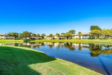 PANORAMIC WATER VIEWS! Serenity meets modern living! This bright on Hunters Run Golf and Country Club in Florida - for sale on GolfHomes.com, golf home, golf lot