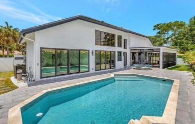 This fully renovated contemporary estate is nestled in the on Broken Sound Golf and Club  in Florida - for sale on GolfHomes.com, golf home, golf lot