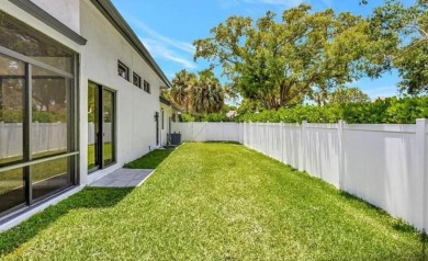 This fully renovated contemporary estate is nestled in the on Broken Sound Golf and Club  in Florida - for sale on GolfHomes.com, golf home, golf lot
