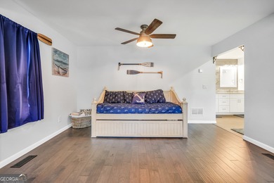 Lakefront Living in Turtle Cove! Welcome to this stunning on Turtle Cove Golf Course in Georgia - for sale on GolfHomes.com, golf home, golf lot