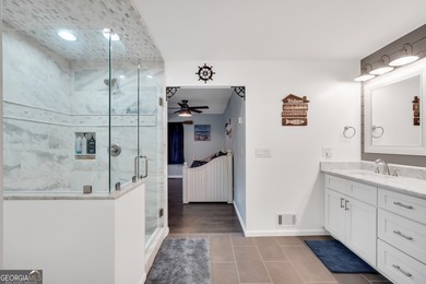 Lakefront Living in Turtle Cove! Welcome to this stunning on Turtle Cove Golf Course in Georgia - for sale on GolfHomes.com, golf home, golf lot