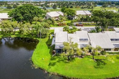 PANORAMIC WATER VIEWS! Serenity meets modern living! This bright on Hunters Run Golf and Country Club in Florida - for sale on GolfHomes.com, golf home, golf lot