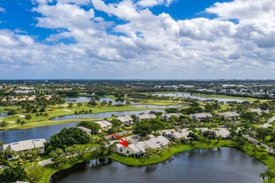 PANORAMIC WATER VIEWS! Serenity meets modern living! This bright on Hunters Run Golf and Country Club in Florida - for sale on GolfHomes.com, golf home, golf lot