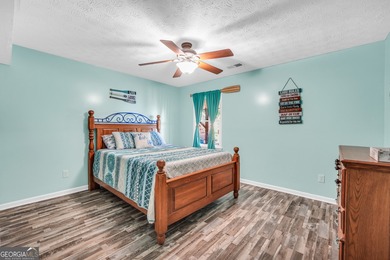 Lakefront Living in Turtle Cove! Welcome to this stunning on Turtle Cove Golf Course in Georgia - for sale on GolfHomes.com, golf home, golf lot