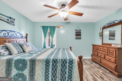 Lakefront Living in Turtle Cove! Welcome to this stunning on Turtle Cove Golf Course in Georgia - for sale on GolfHomes.com, golf home, golf lot