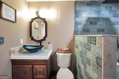 Lakefront Living in Turtle Cove! Welcome to this stunning on Turtle Cove Golf Course in Georgia - for sale on GolfHomes.com, golf home, golf lot