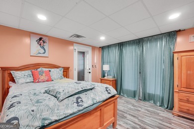 Lakefront Living in Turtle Cove! Welcome to this stunning on Turtle Cove Golf Course in Georgia - for sale on GolfHomes.com, golf home, golf lot