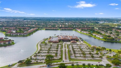 SPACIOUS UNIT WITH ACCORDIAN SHUTTERS AND A SCREENED BALCONY on Flamingo Lakes Country Club in Florida - for sale on GolfHomes.com, golf home, golf lot