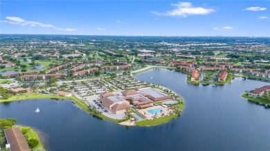 SPACIOUS UNIT WITH ACCORDIAN SHUTTERS AND A SCREENED BALCONY on Flamingo Lakes Country Club in Florida - for sale on GolfHomes.com, golf home, golf lot