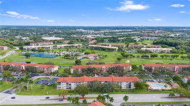 SPACIOUS UNIT WITH ACCORDIAN SHUTTERS AND A SCREENED BALCONY on Flamingo Lakes Country Club in Florida - for sale on GolfHomes.com, golf home, golf lot