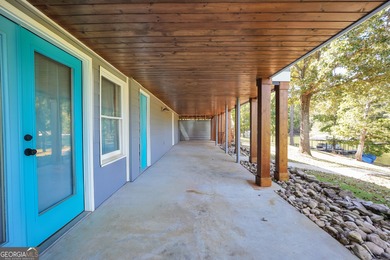 Lakefront Living in Turtle Cove! Welcome to this stunning on Turtle Cove Golf Course in Georgia - for sale on GolfHomes.com, golf home, golf lot