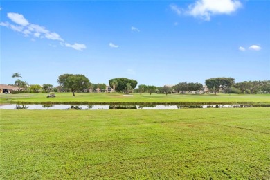 SPACIOUS UNIT WITH ACCORDIAN SHUTTERS AND A SCREENED BALCONY on Flamingo Lakes Country Club in Florida - for sale on GolfHomes.com, golf home, golf lot