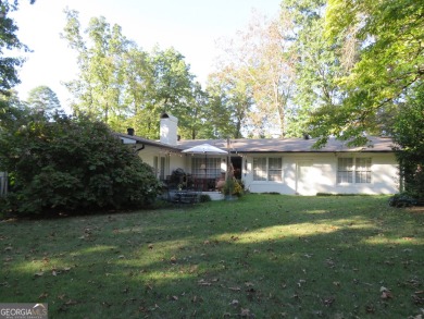 This sprawling brick ranch is in the perfect location! Minutes on Cherokee Golf and Country Club in Georgia - for sale on GolfHomes.com, golf home, golf lot