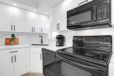 Stunningly remodeled 1 bed, 1.5 bath Penthouse condo in 55+ on Hollybrook Golf and Tennis Club  in Florida - for sale on GolfHomes.com, golf home, golf lot