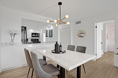 Stunningly remodeled 1 bed, 1.5 bath Penthouse condo in 55+ on Hollybrook Golf and Tennis Club  in Florida - for sale on GolfHomes.com, golf home, golf lot
