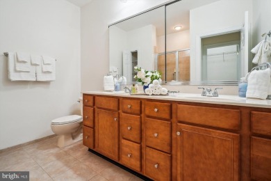 Are you ready for low maintenance and main level living, but on Regency At Dominion Valley Country Club in Virginia - for sale on GolfHomes.com, golf home, golf lot