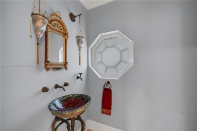 Step into the world of the privileged at Deering Bay, Miami's on Deering Bay Yacht and Country Club in Florida - for sale on GolfHomes.com, golf home, golf lot