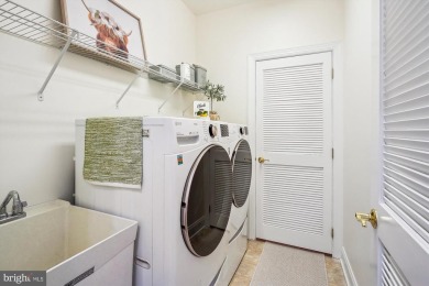 Are you ready for low maintenance and main level living, but on Regency At Dominion Valley Country Club in Virginia - for sale on GolfHomes.com, golf home, golf lot