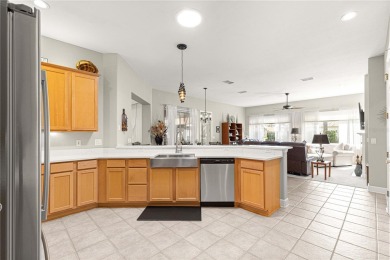 Welcome to this stunning Hampton floor plan home, located in the on Eagle Ridge At Spruce Creek Country Club in Florida - for sale on GolfHomes.com, golf home, golf lot