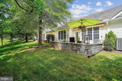 Are you ready for low maintenance and main level living, but on Regency At Dominion Valley Country Club in Virginia - for sale on GolfHomes.com, golf home, golf lot