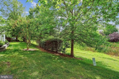 Are you ready for low maintenance and main level living, but on Regency At Dominion Valley Country Club in Virginia - for sale on GolfHomes.com, golf home, golf lot