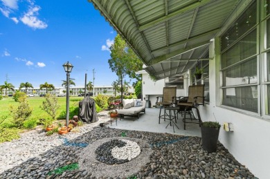 BRAND NEW METAL ROOF! Welcome to this beautiful Challenger model on Leisureville Community Golf Course in Florida - for sale on GolfHomes.com, golf home, golf lot