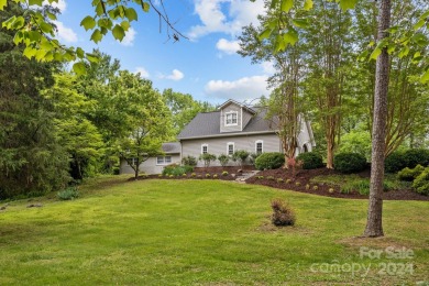 Situated on top of a hill, this stunning 4 bed,2 1/2 bath home on The Crescent Golf Club in North Carolina - for sale on GolfHomes.com, golf home, golf lot