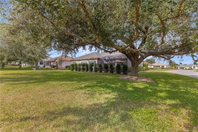 Welcome to this stunning Hampton floor plan home, located in the on Eagle Ridge At Spruce Creek Country Club in Florida - for sale on GolfHomes.com, golf home, golf lot