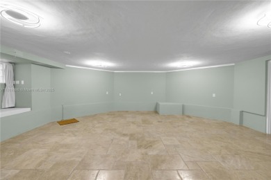 Step into a world of privilege at Deering Bay, Miami's most on Deering Bay Yacht and Country Club in Florida - for sale on GolfHomes.com, golf home, golf lot