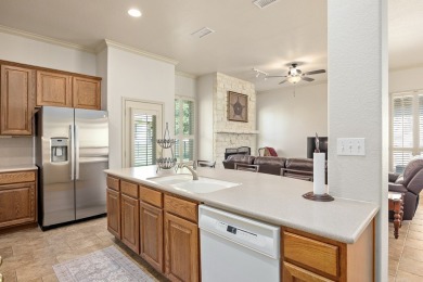 Charming garden home with lovely front courtyard sits across on The Club At Comanche Trace in Texas - for sale on GolfHomes.com, golf home, golf lot