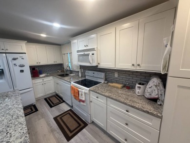 Location! Location! This is a must see home!!   This beautifully on Del Tura Golf and Country Club in Florida - for sale on GolfHomes.com, golf home, golf lot