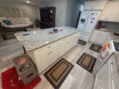 Location! Location! This is a must see home!!   This beautifully on Del Tura Golf and Country Club in Florida - for sale on GolfHomes.com, golf home, golf lot