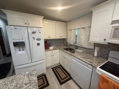 Location! Location! This is a must see home!!   This beautifully on Del Tura Golf and Country Club in Florida - for sale on GolfHomes.com, golf home, golf lot
