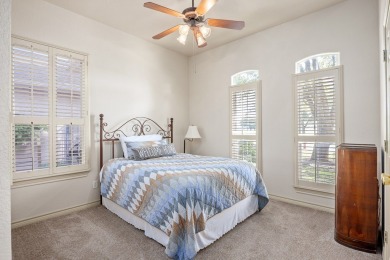 Charming garden home with lovely front courtyard sits across on The Club At Comanche Trace in Texas - for sale on GolfHomes.com, golf home, golf lot