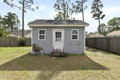 Located in desirable Boiling Spring Lakes, this three bedroom on The Lakes Country Club in North Carolina - for sale on GolfHomes.com, golf home, golf lot