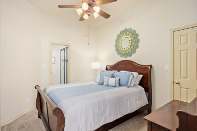 Charming garden home with lovely front courtyard sits across on The Club At Comanche Trace in Texas - for sale on GolfHomes.com, golf home, golf lot