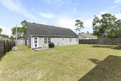 Located in desirable Boiling Spring Lakes, this three bedroom on The Lakes Country Club in North Carolina - for sale on GolfHomes.com, golf home, golf lot