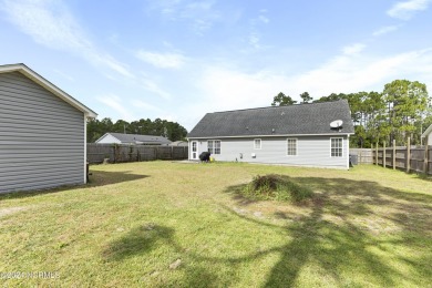 Located in desirable Boiling Spring Lakes, this three bedroom on The Lakes Country Club in North Carolina - for sale on GolfHomes.com, golf home, golf lot