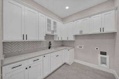 This exquisite gem nestled in the prestigious Ridges subdivision on Ridges Golf and Country Club in Tennessee - for sale on GolfHomes.com, golf home, golf lot