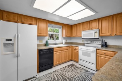 This is the perfect opportunity to own a fully furnished, well on Tarpon Woods Golf Club in Florida - for sale on GolfHomes.com, golf home, golf lot